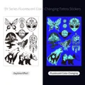 Luminous gold foil temporary tattoo stickers with butterfly and wolf motifs in UV light - Fluorescent BY-003
