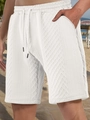 Detail of white waffle texture fabric and adjustable drawstring on men's beach shorts - S / White