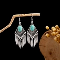 Macro shot of ethnic boho earrings featuring turquoise stones and silver-tone metal tassels - E2870-4/Rhombus Pattern Turquoise Tassel