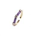 Detail of purple enamel ring with cubic zirconia stones on gold band with open design - Adjustable Open / Purple