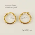 Créoles torsadées en acier inoxydable plaqué or 18K avec diamètre de 23 mm - 23mm de Diamètre / Doré