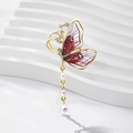Golden butterfly brooch with purple enamel wings and sparkling zircon tassel detail - Style 74/Purple Tassel Rhinestone