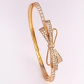 Luxury gold plated bow bangle featuring sparkling pave white cubic zirconia for women - Bowknot Shape / Gold with White Zirconia