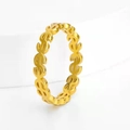 Detail view of the intricate dollar sign pattern on this stylish gold stainless steel ring - Gold