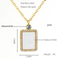 Detail of 18K gold plated necklace with June alexandrite stone and natural shell pendant - June Alexandrite Style (ZN703G-06)