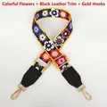 Close-up of floral wide strap with black leather ends and gold metal hardware hooks - Colorful Flowers + Black Leather / Silver Hook