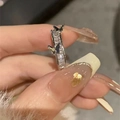 Silver bow ring featuring rectangular gemstones and 3D butterfly accents in polished finish - No. 24 Open Ring