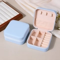 Portable light blue PU leather jewelry box with pink velvet lining and zipper - Light Blue