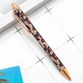 Leopard print ballpoint pen with rose gold accents and stylish patterned barrel - Rose Gold Leopard