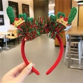 Red Christmas headband with green sequin antlers and gold festive ornaments - Green Comb Antler Headband