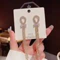 Pendientes de borla de plata S925 con cristales brillantes y elegante detalle de lazo - Borla de mariposa dorada (E0118 Dorado)
