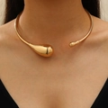 Gold minimalist metal choker necklace featuring a water drop design worn by a model - Teardrop Ball Open Gold Style (KC Gold 7949)