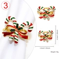 Detail of candy cane napkin ring with red bow and enamel finish for Christmas decor - 3-Candy Cane with Bow