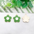 Three green and white enamel flower charms with gold metal edges shown on marble surface - Green Enamel Flower 19x21mm