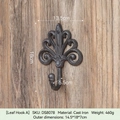 Vintage lily flower cast iron wall hook with matte black finish on rustic wood background - Leaf Hook A-DS8078
