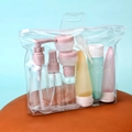 Set da viaggio 11 pezzi con flaconi spray e dispenser in una pochette trasparente - Set Colorato da 11 Pezzi