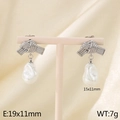 Silver bow knot earrings with baroque pearl drop including size 19x11mm specifications - Silver Bowknot Knot Shell Earrings / Silver (KE116092-GC)