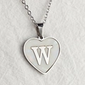 Silver heart necklace with letter W and mother of pearl inlay on white fabric - Letter W / Silver
