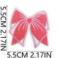 Macro detail of pink embroidered bow patch showing precise 5.5cm dimensions on white background - No. 1