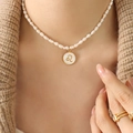 Cultured freshwater pearl necklace with gold Leo zodiac pendant for women - Leo