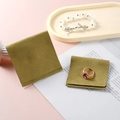 Olive green microfiber jewelry snap pouches in two sizes on a minimalist display - 7x7cm / Fruit Green