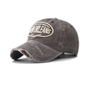 Detailed macro of distressed cotton baseball cap with New Orleans embroidery text - Adjustable / Coffee