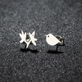 Asymmetric stainless steel bird and branch stud earrings with polished silver finish - Bird & Leaf / Steel