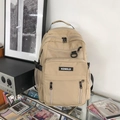 Zaino scolastico beige capiente con tasche multiple in stile campus minimalista - Con portachiavi a forma di rana grigia / Cachi