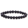 Macro shot of 8mm blue goldstone beaded bracelet with shimmering starry sky effect - Blue Sandstone