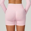 Pantaloncini da yoga rosa senza cuciture a vita alta con bordo bianco ed effetto push-up - Contrasto Bianco e Rosa