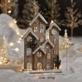 Lighted 42cm wooden Christmas house with snow-dusted roof and warm LED glow - Half Face Natural Medium