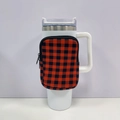 Detail of red and black plaid zipper pouch attached to a white 40oz tumbler handle - No. 10 Black Red Plaid