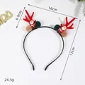 Christmas headband featuring red reindeer antlers and mini Santa Claus figures - Antler Gnome
