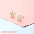 Minimalist gold flower stud earrings with petite zircon pavé petals, size 0.7cm - Five-pointed Star