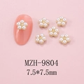 Detailed 7.5mm white pearl nail art charms with golden metal base on pink background - Medium Pearl Flower (9804) / 1 Piece