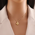 Golden stainless steel necklace featuring a 3D letter J pendant on a satellite bead chain - Letter J