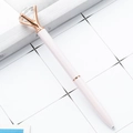 Elegant white ballpoint pen with rose gold metal trim and a large crown diamond crystal - Light Pink with Rose Gold Parts