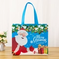 Blue non-woven Christmas gift bag with Santa Claus print and ribbon handles - Blue Christmas