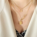 Collana a doppio strato in acciaio al titanio dorato con ciondolo a stella e piastra BLISS - Oro