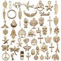 Variété de 50 breloques en alliage doré pour la fabrication de bijoux DIY - 50 Pièces Or KC Mixte (M377)