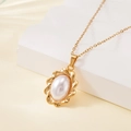 Elegant gold-plated stainless steel necklace with oval white pearl shell pendant - Wave Texture Oval Pearl Style (137616)
