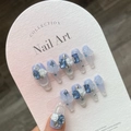 Handmade light purple translucent press-on nails with blue gems and white rose relief - Lavender Blue Diamond Rose Embossed Style (860)