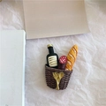 3D picnic basket fridge magnet with miniature wine, salami, and baguette bread details - Champagne & Ham Bread Basket