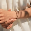 Bohemian 18K gold plated bracelet with sparkling champagne zircons on a model's wrist - 18K White Gold Plated / Silver-Champagne Marquise (KB0767-3)