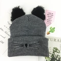 Chic grey knit beanie with cat ears and embroidery on white background - Deep Heather Grey