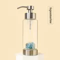 Glass lotion bottle with Aquamarine crystal stones and stainless steel pump - Aquamarine