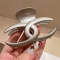 Detail shot of a large Y2K metallic silver claw clip with a sleek pearlescent finish - Pearly Silver Style (FJ3798)