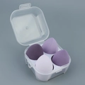 Set of four soft purple gradient makeup sponges in a clear plastic storage container - 4-Grid Transparent Purple Series