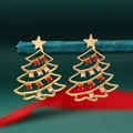 Christmas tree stud earrings with gold metal and red and white rhinestones on green stand - Red White