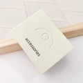 Minimalist beige rectangular accessory box with accessories text on light wood background - 6.4x5cm Yellow Card / 1 Sheet